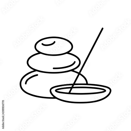 Incense stick and stone stack.
