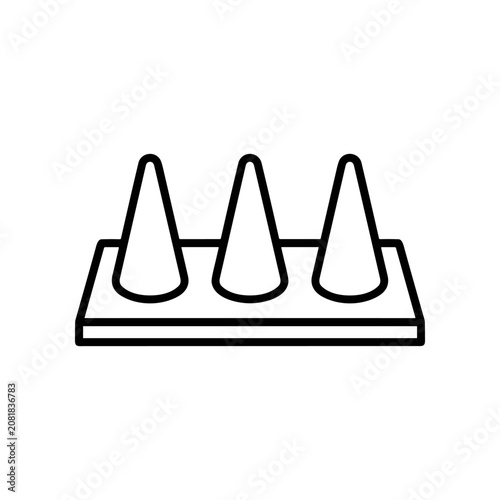 Three cone shaped objects on base.