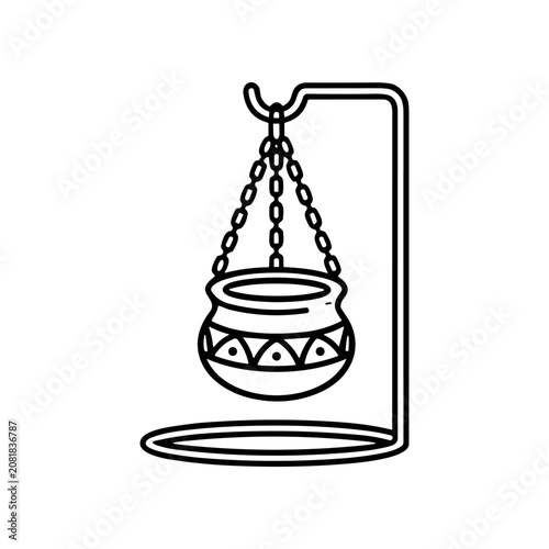 Decorative hanging clay pottery vessel.