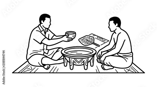 Two men sitting on a mat sharing a traditional drink from a bowl.