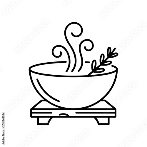 Obraz na plátně Steaming bowl of soup with herbs.