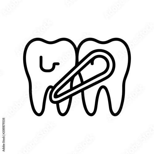 Dental molar with paper clip.