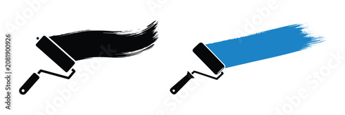 Foto Paint rollers with black and blue paint strokes on a flat surface