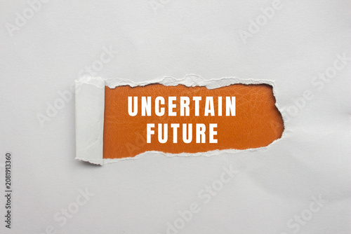 Quadro su tela White ripped paper revealing orange background with the message uncertain future