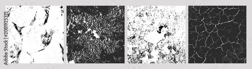 Foto Set of four black-and-white cracked and distressed textures, including cracked p