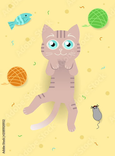 Cute tabby cat lying on its back with toys on yellow background, vector illustration. Playful kitten with yarn balls, toy mouse and fish