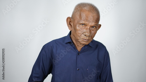Elderly Asian Man Portrait, Wrinkled Face, Kind Expression, Studio Shot, White Background