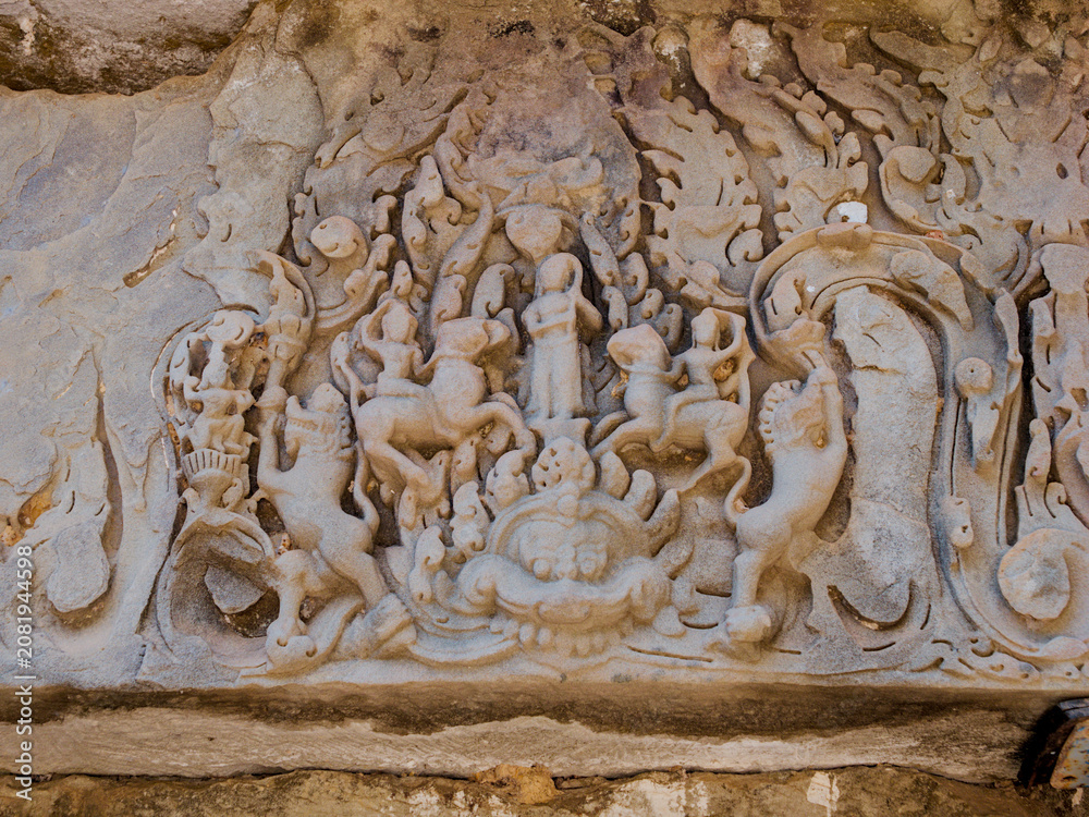 Obraz premium Intricate Khmer Bas-Relief Carving at Ta Prohm Temple, Angkor, Cambodia