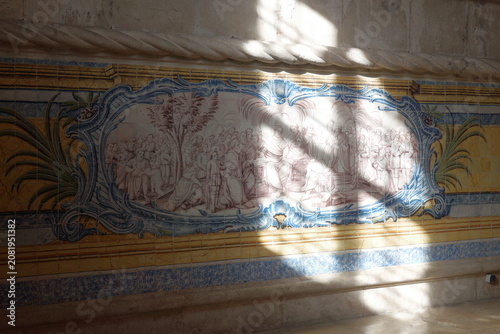 Bild auf Leinwand Sunlit azulejo tile panel depicting a biblical narrative scene with baroque blue