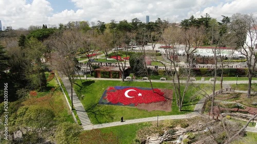 Aerial view of the Bosphorus with tulips; view of the Turkish flag; general aerial view of Istanbul