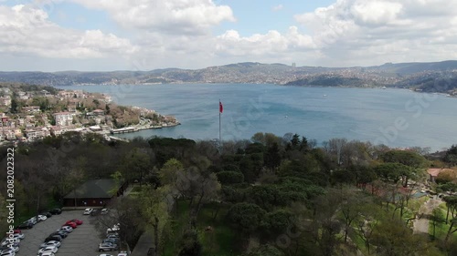 Aerial view of the Bosphorus with tulips; view of the Turkish flag; general aerial view of Istanbul