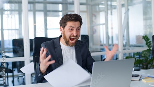 Obraz na plátně Overworked stressed Caucasian middle-aged business man reading letters bank reje