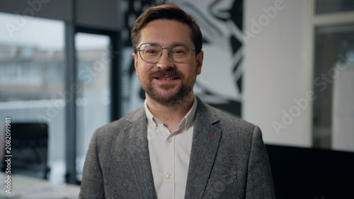 Cuadro en lienzo Close up Caucasian adult business man look to side smiling looking at camera smi