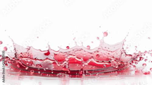 Red liquid splash creating a crown shape on white background