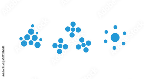 Cluster of blue circular dots forming abstract shapes.