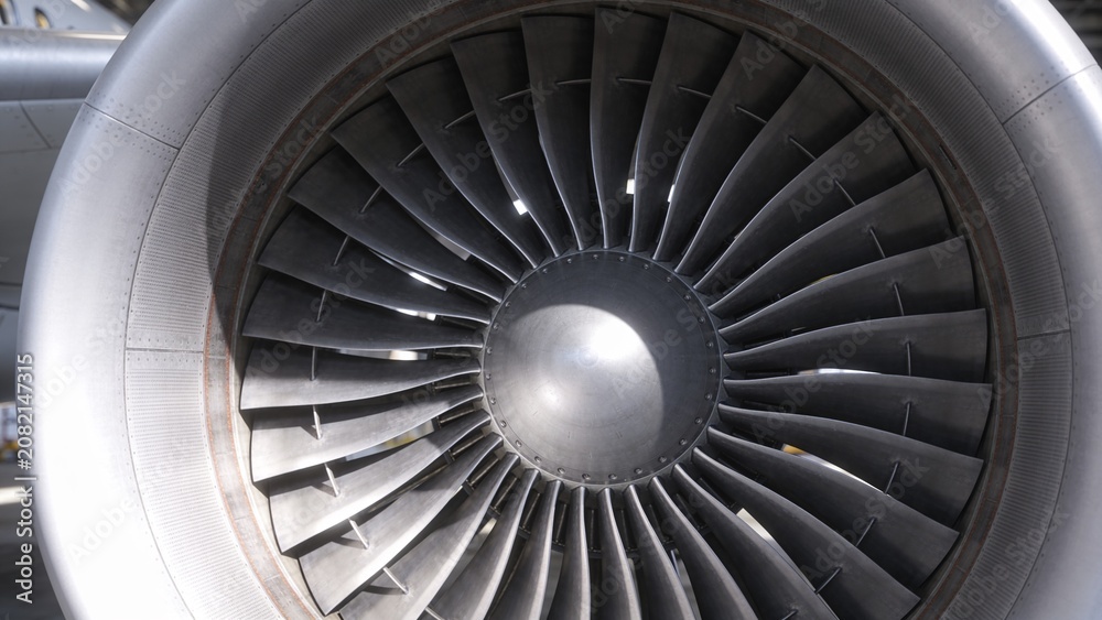 Fototapeta premium Close-up view of a jet engine's fan blades on an airplane