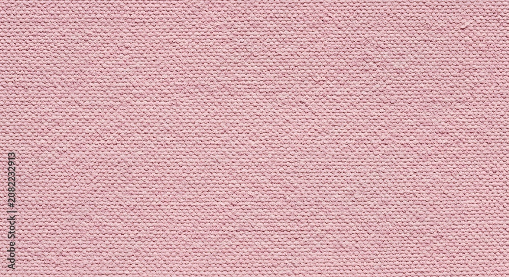 Fototapeta premium Light pink knitted fabric texture dense woven yarn loops pattern textile.