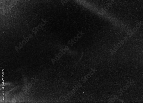 Foto Dusty scratched and scanned old film texture, light leaks overlay effect