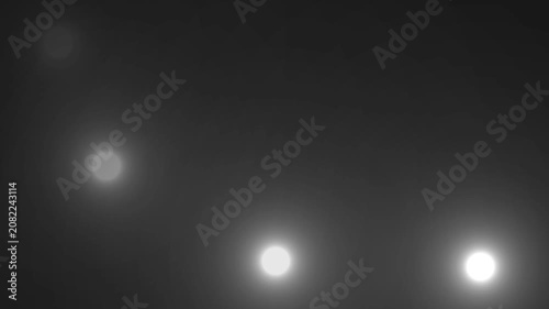 Paparazzi camera flashes, blinking flashlights animation on black background.The scene of thousands of cameras taking pictures.The concept of popularity- Flashing lens flares seamless looping.
