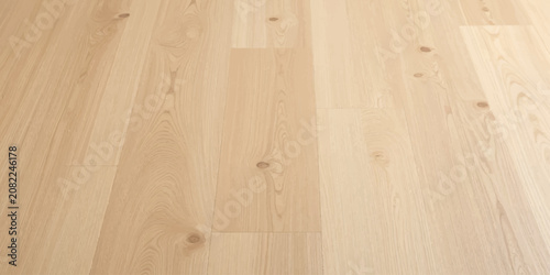 Natural Wooden Plank Floor Texture with Mixed Light and Dark Oak Panels and Knots.