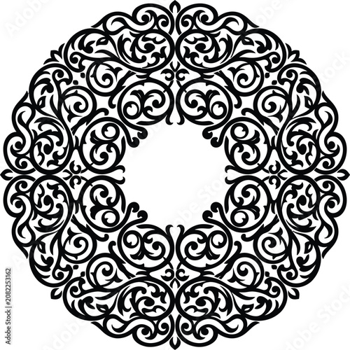 A circular ornamental emblem with a free-flowing.eps