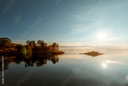 Beautiful sunset over Lake Vattern in Hastholmen, Sweden.