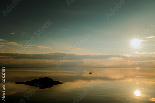 Beautiful sunset over Lake Vattern in Hastholmen, Sweden.