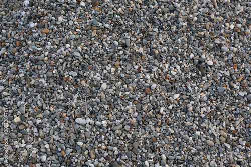 Bild auf Leinwand Close-up view of small gray pebbles and stones texture