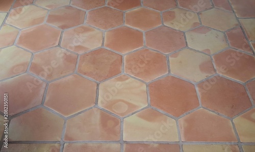 Spanish Hexagonal Terracotta Floor Background with Rustic Clay Texture 