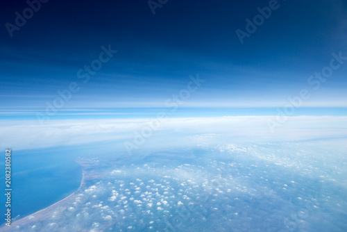 Clouds, a view from airplane window. Sky background