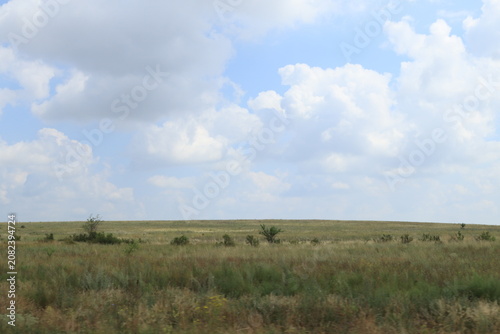 Obraz na plátně clouds over the field
