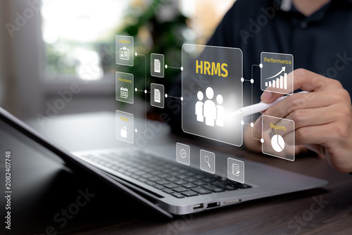 Human resource management system with employee records, attendance, payroll, performance and reporting modules, representing workforce administration and HR analytics.