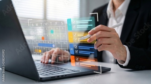 Tableau sur toile Business professional uses a digital calendar and task checklist overlay on a laptop to manage schedules and track productivity