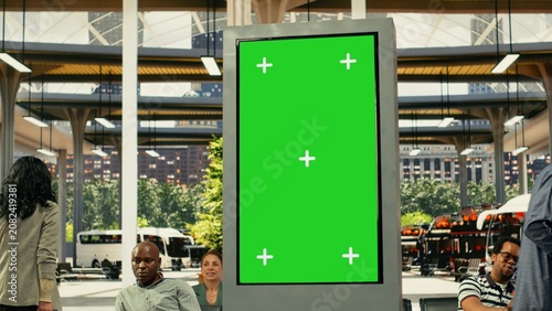 Bilde på lerret Green screen in public transportation station with passengers during weekday commute in a busy city environment