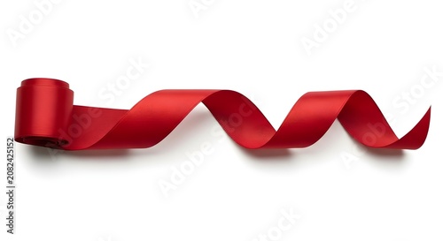 Red Satin Ribbon Unfurling in a Wave Pattern on White red ribbon silk ribbon