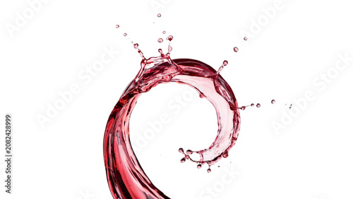 A swirling, circular splash of translucent red liquid forming a graceful, arc with scattered droplets against a deep black background