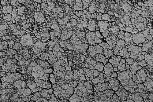 Crack cracked texture lines black brown clay land soil background style cracked texture with cracked pattern abstract backdrop Black white cracked earth texture with dry dried ground pattern