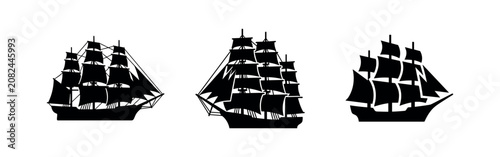 Foto Three black sailing ship icons on white background