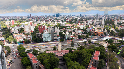 Aerial view of Paseo de la Reforma avenue and skyscrapers. Drone shot of corporate buildings and modern city skyline in Mexico City, CDMX.