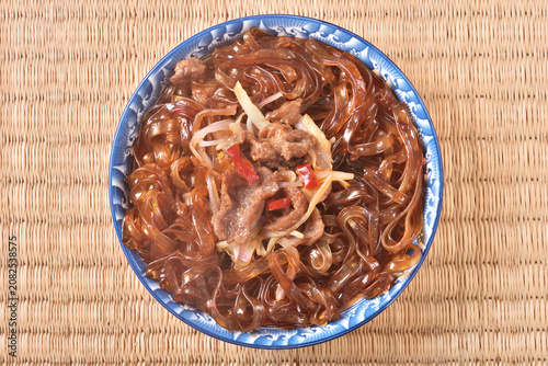 cantonese-styles stir-fried beef wideglass noodles on the plate