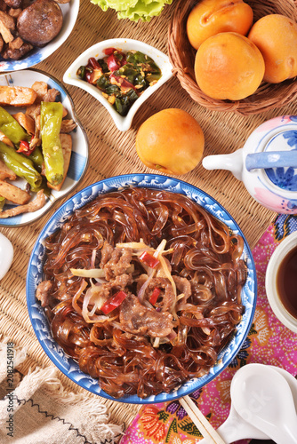cantonese-styles stir-fried beef wideglass noodles on the plate