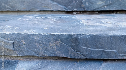 Tapety artystyczne Worn bluestone concave step close up