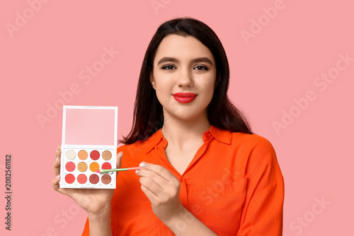 Beautiful young woman with ...
