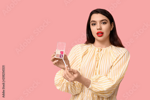 Beautiful young woman with ...