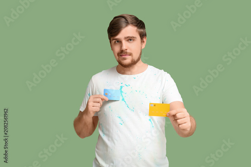Young man with credit cards...