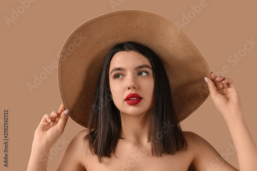 Beautiful young woman in ha...