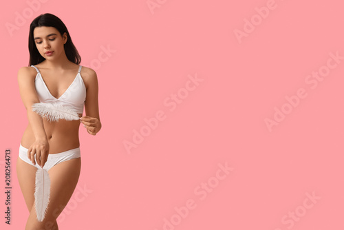Beautiful young woman with ...