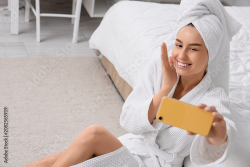 Young woman with towel afte...