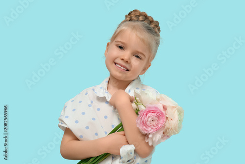Happy little girl with bouq...