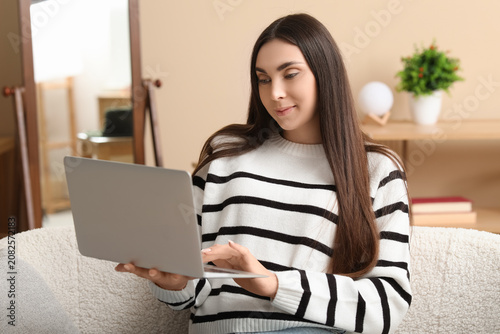 Beautiful young woman with ...